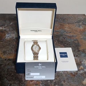 RAYMOND WEIL LADIES DIAMOND AND MOTHER OF PEARL TWO TONE TANGO WATCH..